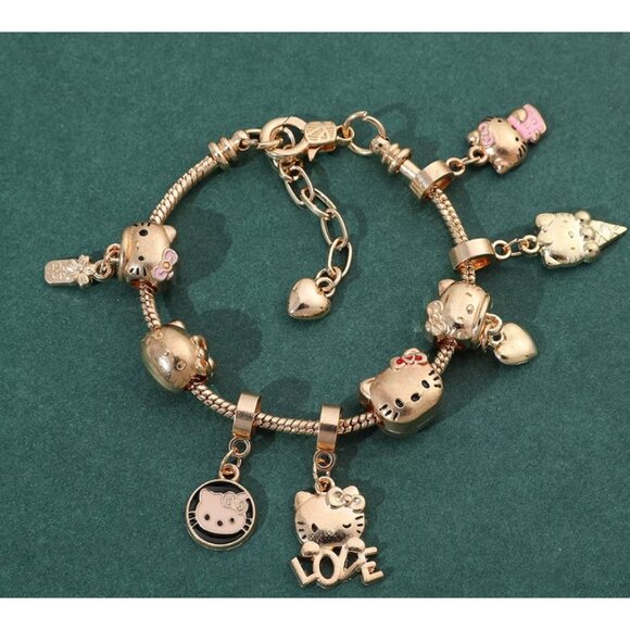Hello Kitty Gold-Tone Charm Bracelet – Love, Ice Cream & Heart Charms - Picture 1 of 5